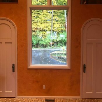  rounded doors installed with orange lighting