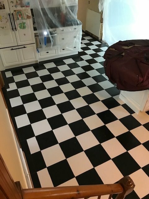 Cincinnati black and white floor tile with counter and stairs