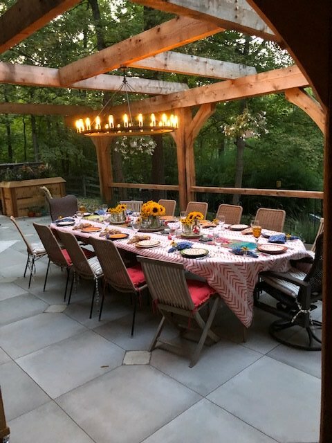 Cincinnati table with chandelier on patio