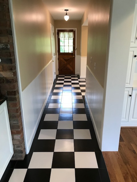 black and white tile hallway