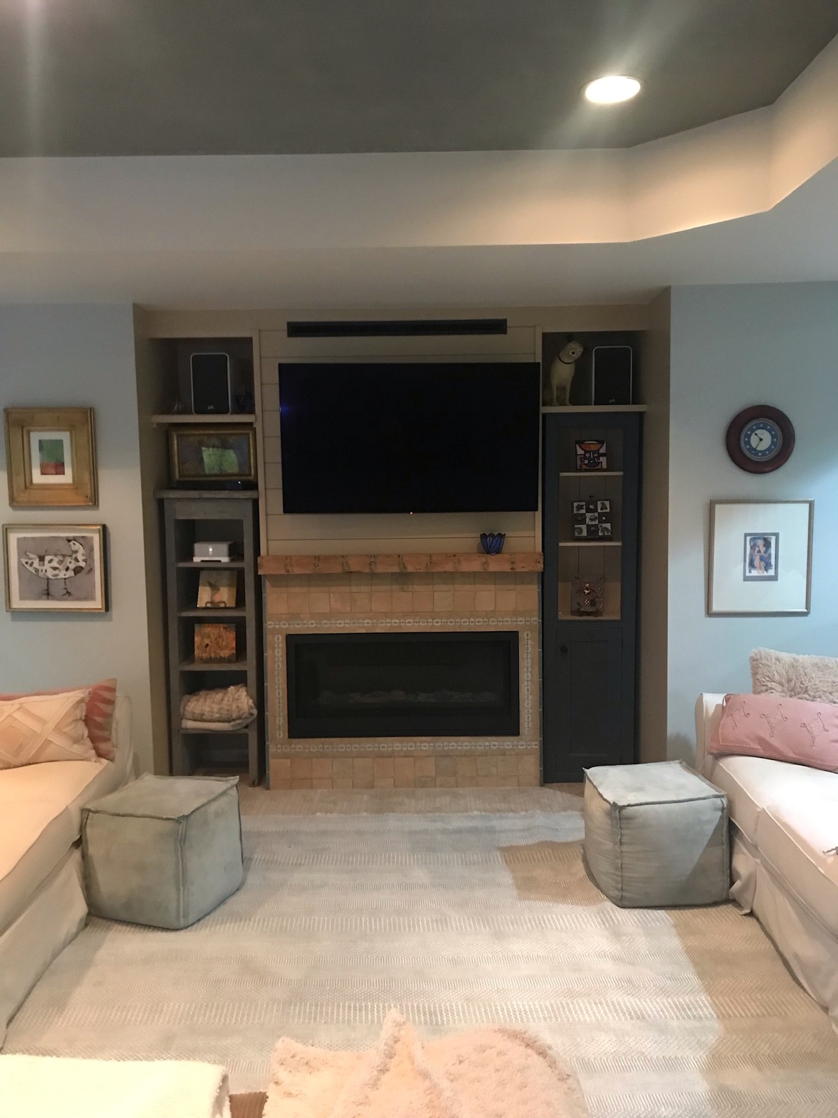 Cincinnati living room with couches, tv, and fireplace