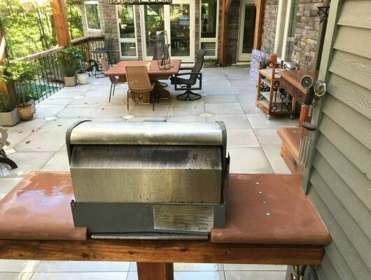 back of grill with patio in background